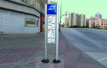 Winnipeg elite totem by side of road.