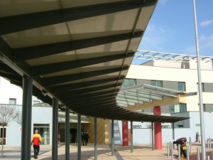 view of long Wembley covered canopy from underneath the canopy.