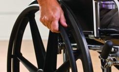 close up of wheelchair wheel being used.