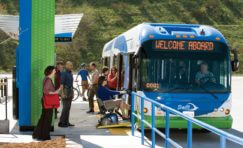 Bus parked at bus stop.