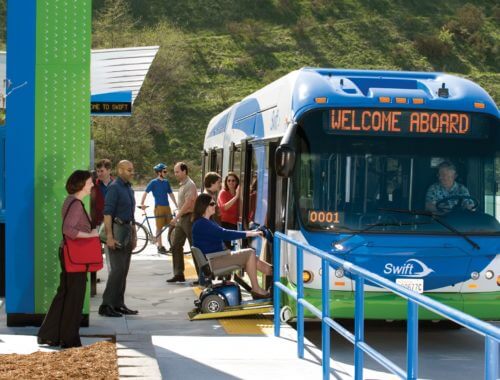 Bus parked at bus stop.