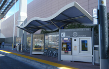 BRT shelter on the side of a road.
