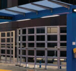 Bus Transit Shelter next to a road.