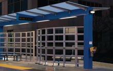 Bus Transit Shelter next to a road.