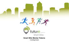 Advertisement image for the Smart Mile City Totems with an outline of a city skyline and people running.